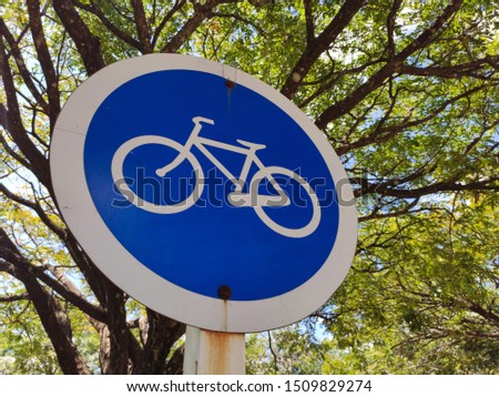 Bicycle lane sign in the park. (2)