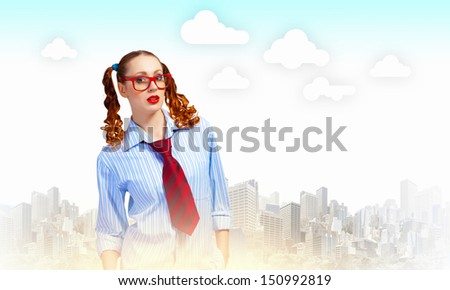Image of confident teenager girl in red glasses