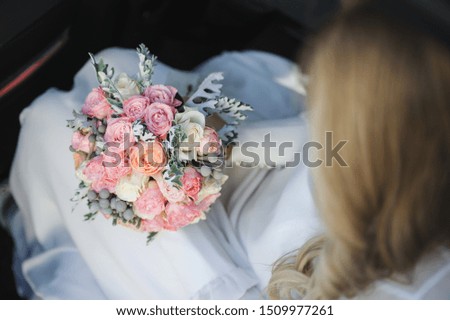 beautiful modern wedding bouquet in bride's hand