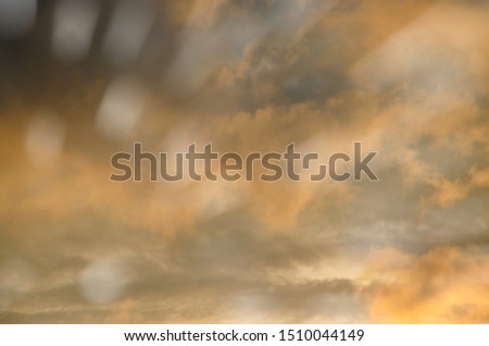 Pastel sky with scattered clouds