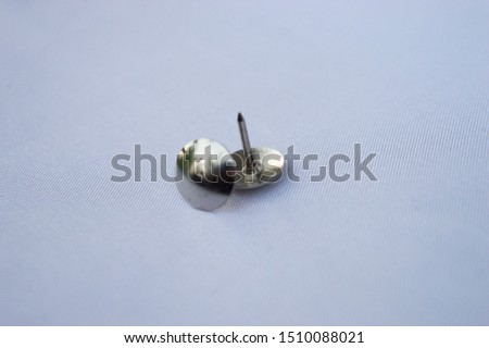 collection metal Thumb Tack,Push Pin head with a white background