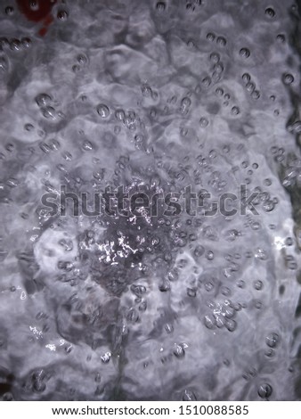 
Defocuss, Water bubbles from the air pump in the aquarium, abstract photo.