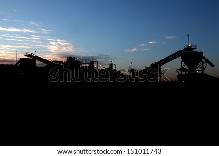 Silhouette of a coal mine in operation in South Africa near Carolina.  Royalty-Free Stock Photo #151011743