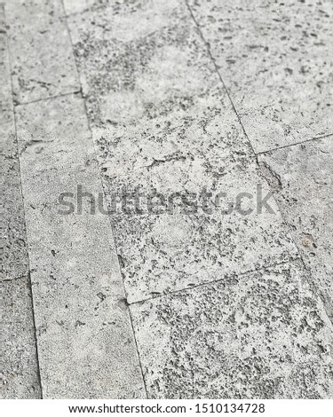 Paving in Roman travertine slabs