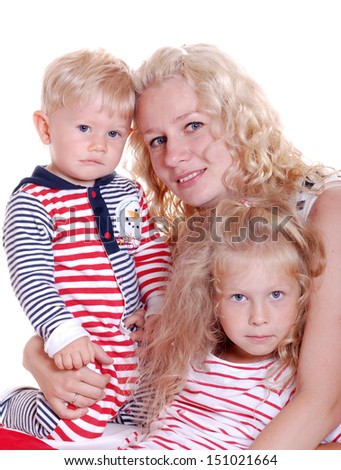 picture of happy mother with two small children on a white background