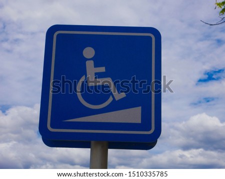 Sing or symbol for mand and woman for wheel chairs symbol.