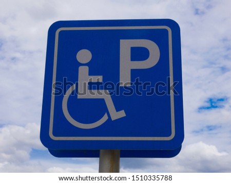 Sing or symbol for mand and woman for wheel chairs symbol.