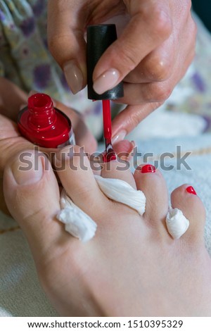 pedicure process macro closeup. pedicure process and spa procedure macro closeup. Concept body care. nail beauty process, polishing and painting