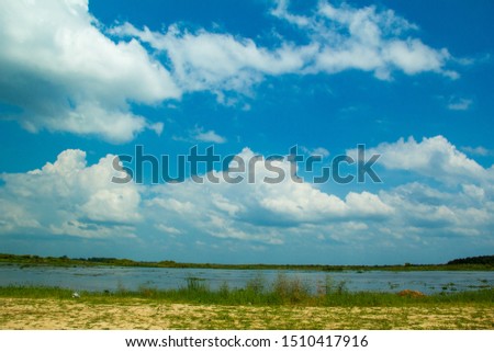 The lake and the blue sky,Rivers and cloudy skies