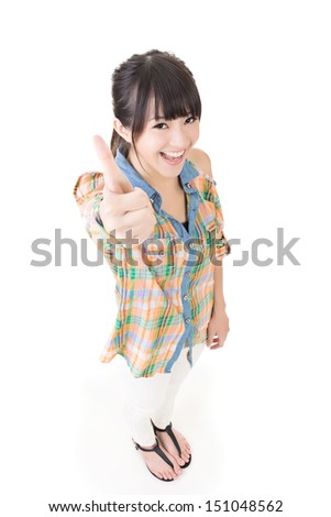 Asian young smiling woman thumbs up. Isolated on the white background.