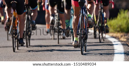 Group of cyclist at professional race, cyclists in a road race stage Royalty-Free Stock Photo #1510489034