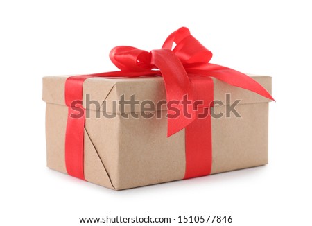 Christmas gift box decorated with ribbon bow on white background