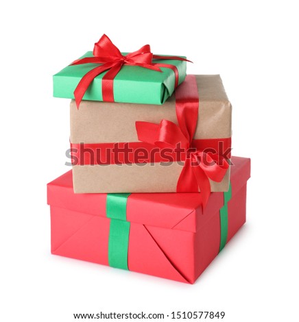 Stack of Christmas gift boxes on white background