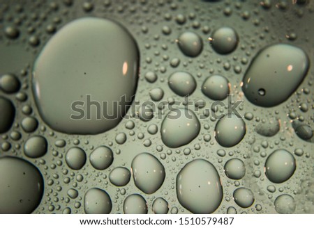 Water droplets on colorful background