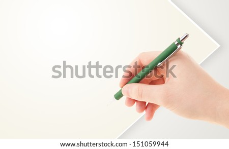 Hand writing on plain empty white paper copy space with pen