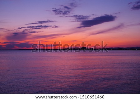 Сolorful sunset on the sea Royalty-Free Stock Photo #1510651460