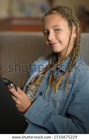 Image of the girl with cell phone. 