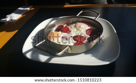 photo of fried sausage eggs with mobile phone