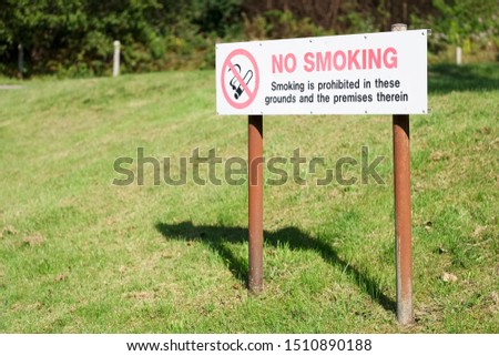 No smoking sign on grass at work grounds uk