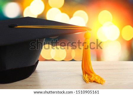 Black hat of university graduates with bokeh Blurred background 