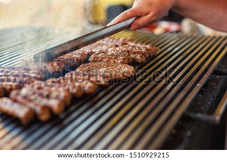 Leskovacki rostilj, pljeskavice, cevapi, ustipci, gurmanska pljeskavica, ustipak gurmanski, cevap banjalucki, Preparing a barbecue on a grill