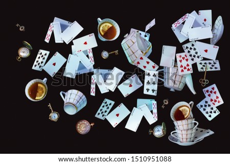 Wonderland background. Mad tea party.Playing cards, pocket watch, key, cup and teapot falling down the rabbit hole. Horizontal banner.