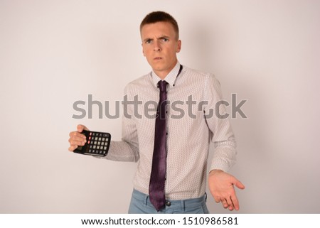 man with calculator in hand business work office emotions white background