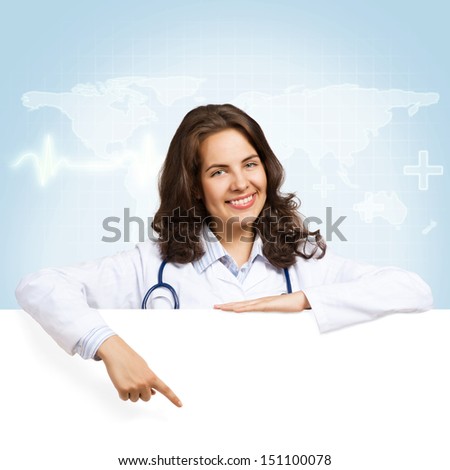 Young attractive female doctor put her hands on the blank banner, points at a place for text