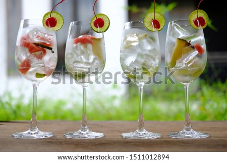 summer drinks alcoholic cocktails on old wooden background 
