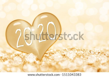 2020, close up on a ice heart in the snow greting card Royalty-Free Stock Photo #1511043383
