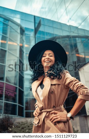 Beautiful brunette fashionable woman posing in Bucharest.