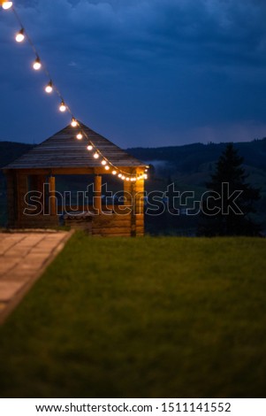 An evening in the Carpathians. Bright lights of the night mountains