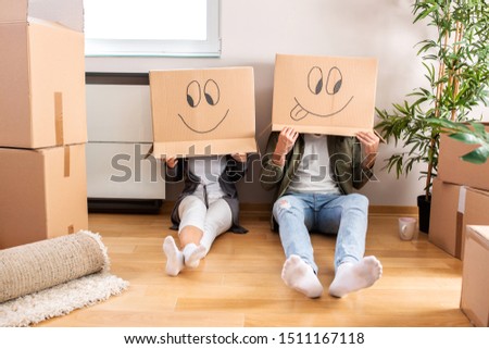 Unpacking new stuff but taking it easy while moving in Royalty-Free Stock Photo #1511167118