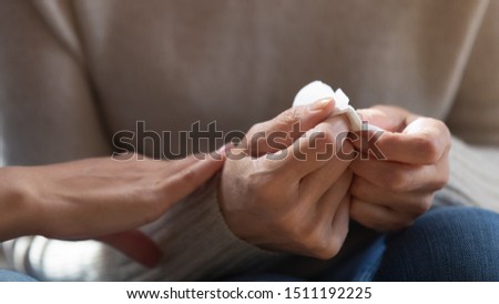 Close up of middle-aged 60 woman hold paper tissue feel stressed depressed melancholic for loss, caring daughter comfort caress sad senior mother show empathy and love, elderly healthcare concept Royalty-Free Stock Photo #1511192225