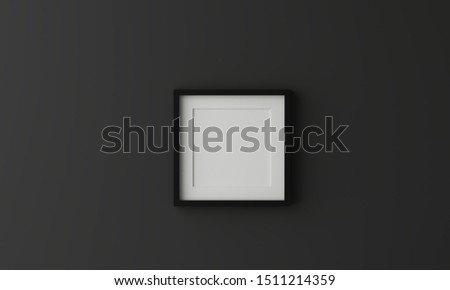 Blank picture frame for insert text or image inside on dark grey color. 