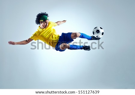 soccer football kick striker scoring goal with accurate shot for brazil team world cup Royalty-Free Stock Photo #151127639