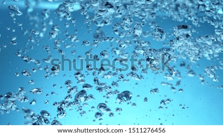 Water oxygen bubbles with soft blue background. Refreshment and drink background