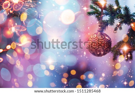 Christmas and New Year holidays background. Glitter lights backdrop. Winter season. Text space. Closeup of Christmas-tree. Elements of this Image Furnished by NASA.