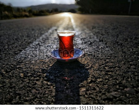  Turkish style black tea on asphalt. tea break on highway 