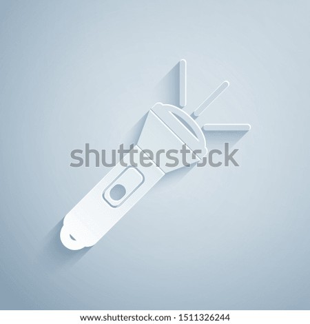 Paper cut Flashlight icon isolated on grey background. Paper art style. Vector Illustration