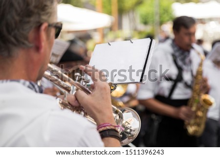 Orchestra plays its instruments at a party in Aranda de Duero, Spain.
