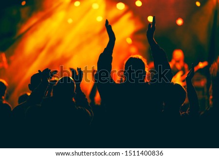 Fans enjoying music rock festival concert. Royalty-Free Stock Photo #1511400836