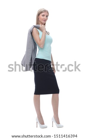 Executive business woman with a jacket over her shoulder