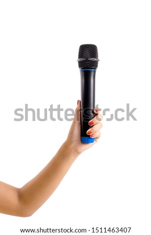The hand of woman holding is a wireless microphone with clipping path isolated on white background