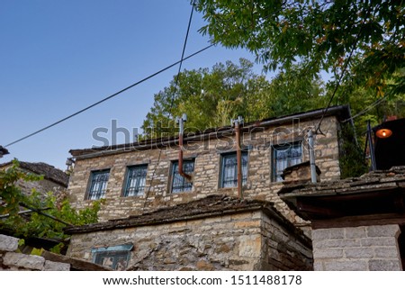 Amazing scenery from the picturesque village of Dilofo  with its architectural traditional old buildings located on Tymfi mount, Zagori, Epirus, north Greece, Europe Royalty-Free Stock Photo #1511488178
