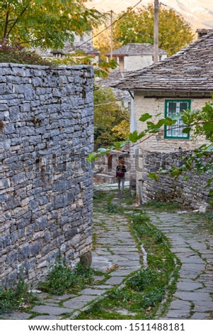 Amazing scenery from the picturesque village of Dilofo  with its architectural traditional old buildings located on Tymfi mount, Zagori, Epirus, north Greece, Europe Royalty-Free Stock Photo #1511488181