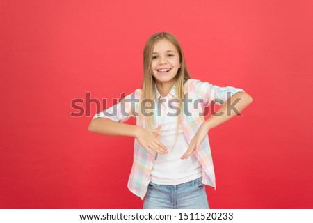hip and stylish. smiling blonde kid. child girl with long blonde hair. casual style. childrens day. fashionable little girl. kid fashion. stylish beauty. small girl red background. happy childhood.