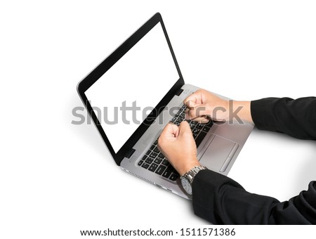 Notebook computer are smashed by Businessman hands wearing black suits isolated on white background. Clipping path include in this image.