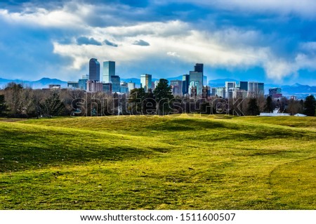Clouds Gather over Denver Skyline in the Evening - Grassy Field 