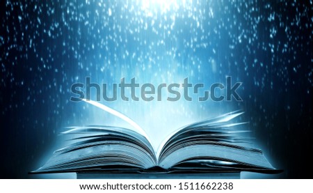 Imagine a picture book of an ancient book opened on a wooden table with a sparkling golden background. With magical power, magic, lightning around a glowing glowing book In the room of darkness